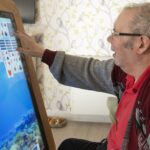Man using touch screen